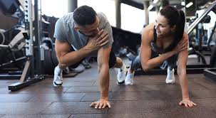 Toning Bingo Wings: Your Ultimate Guide to Sculpting Sleek Arms at the Gym 3 Fitness trainer demonstrating arm toning exercises Beaconsfield