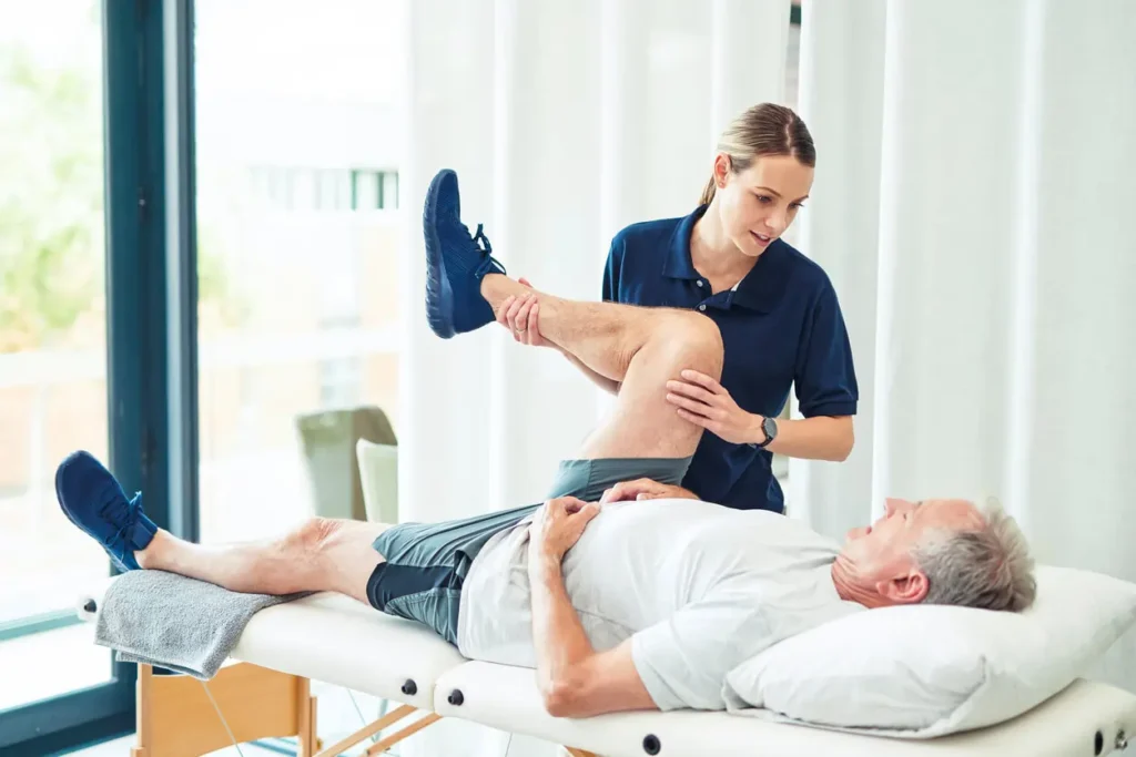 Revitalising Recovery: Effective Rehabilitation Strategies for Muscle Injuries 3 Physiotherapist assisting a patient with muscle recovery exercises Beaconsfield