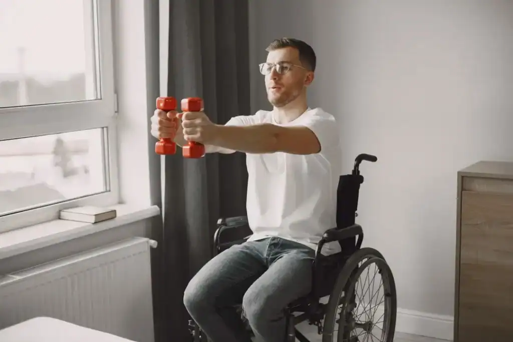 Image of man doing exercise in his wheelchair to aid weight loss Beaconsfield